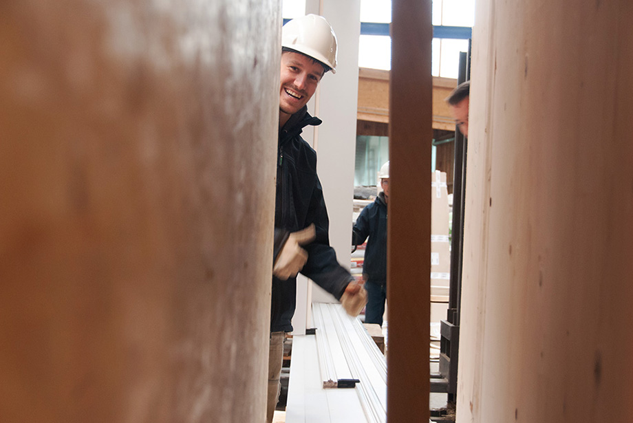 Philipp is taking a peek inside the gap in which the window will slide into