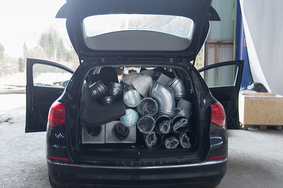 A car trunk full of pipes