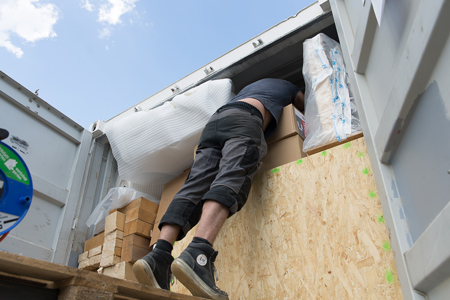 Claus is stuck in a container. 