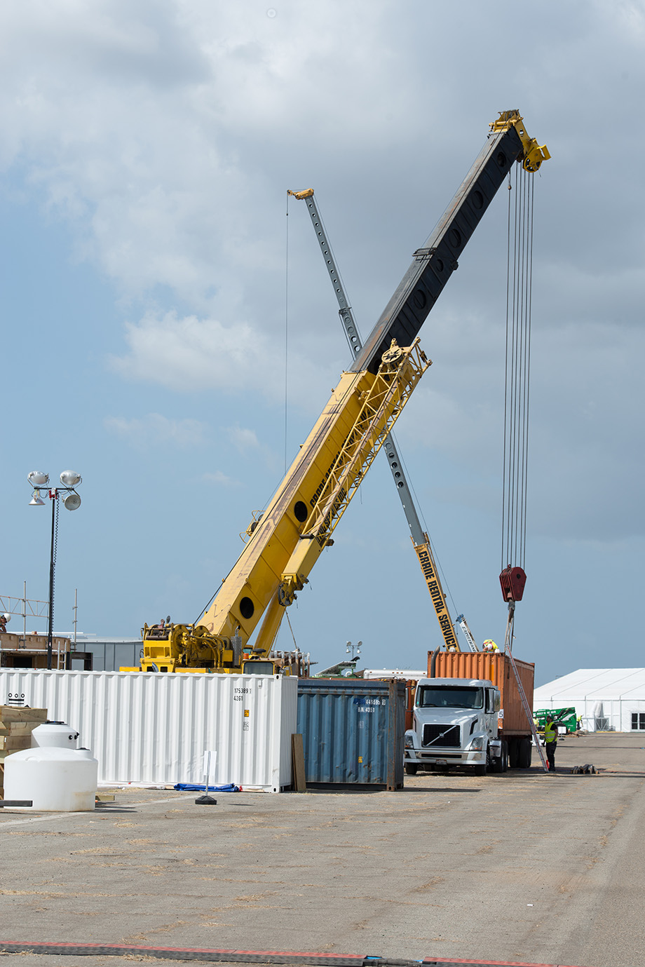 Crane lifting off the container.