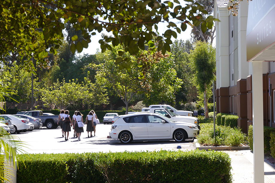 A group of LISI decathletes walking across a parking space.