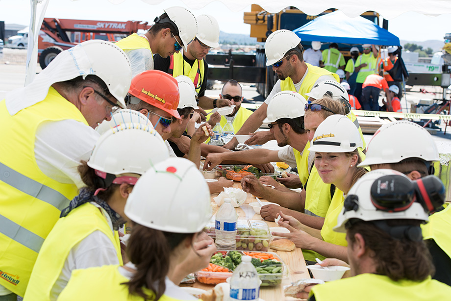 Lunch has arrived. The team gathers.