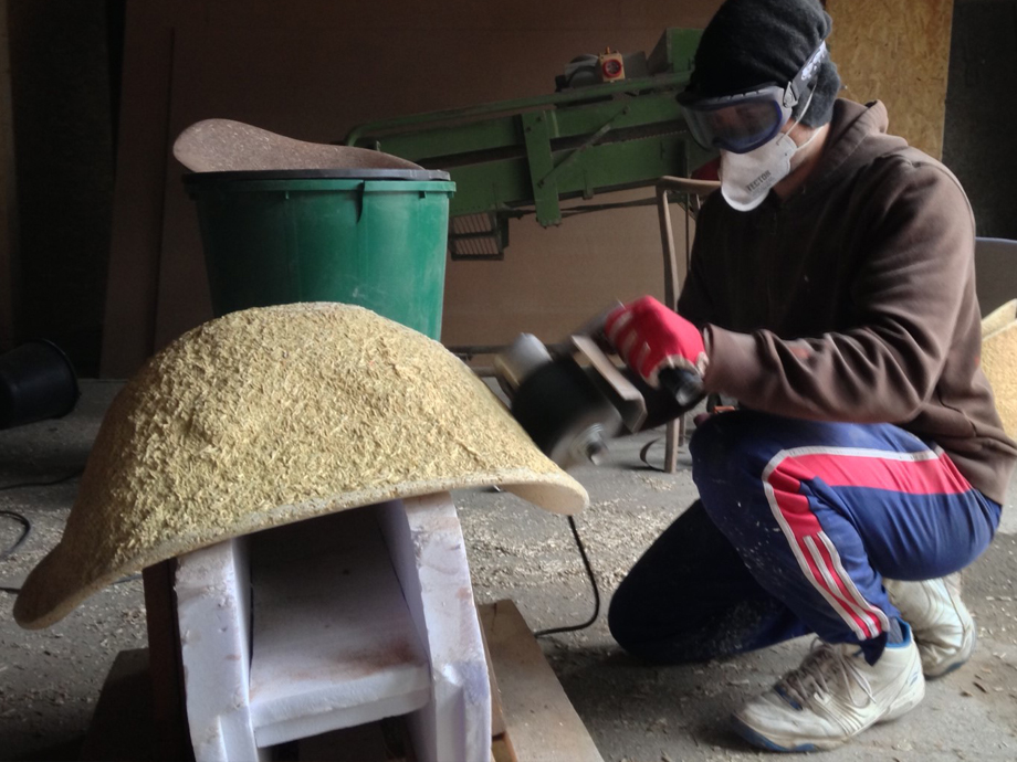 Manufacturing the outside of a chair. 