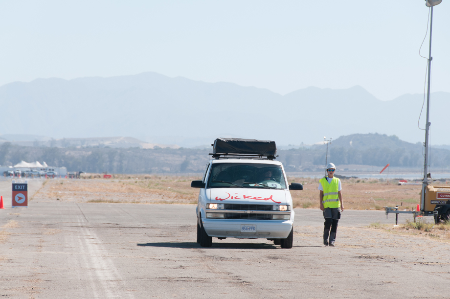 Walking alongside our van on the runway.