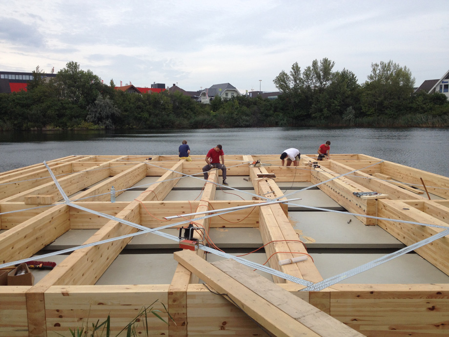 The construction placed on top of the pontoons is made of wood.