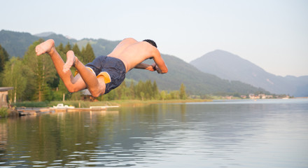 Cover Photo of a decathlete jumping in a lake