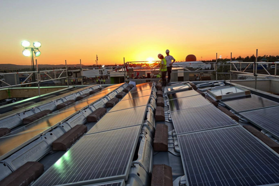 The sun sets over the solar village.