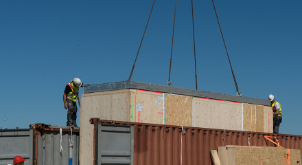 Crane lifting the service core
